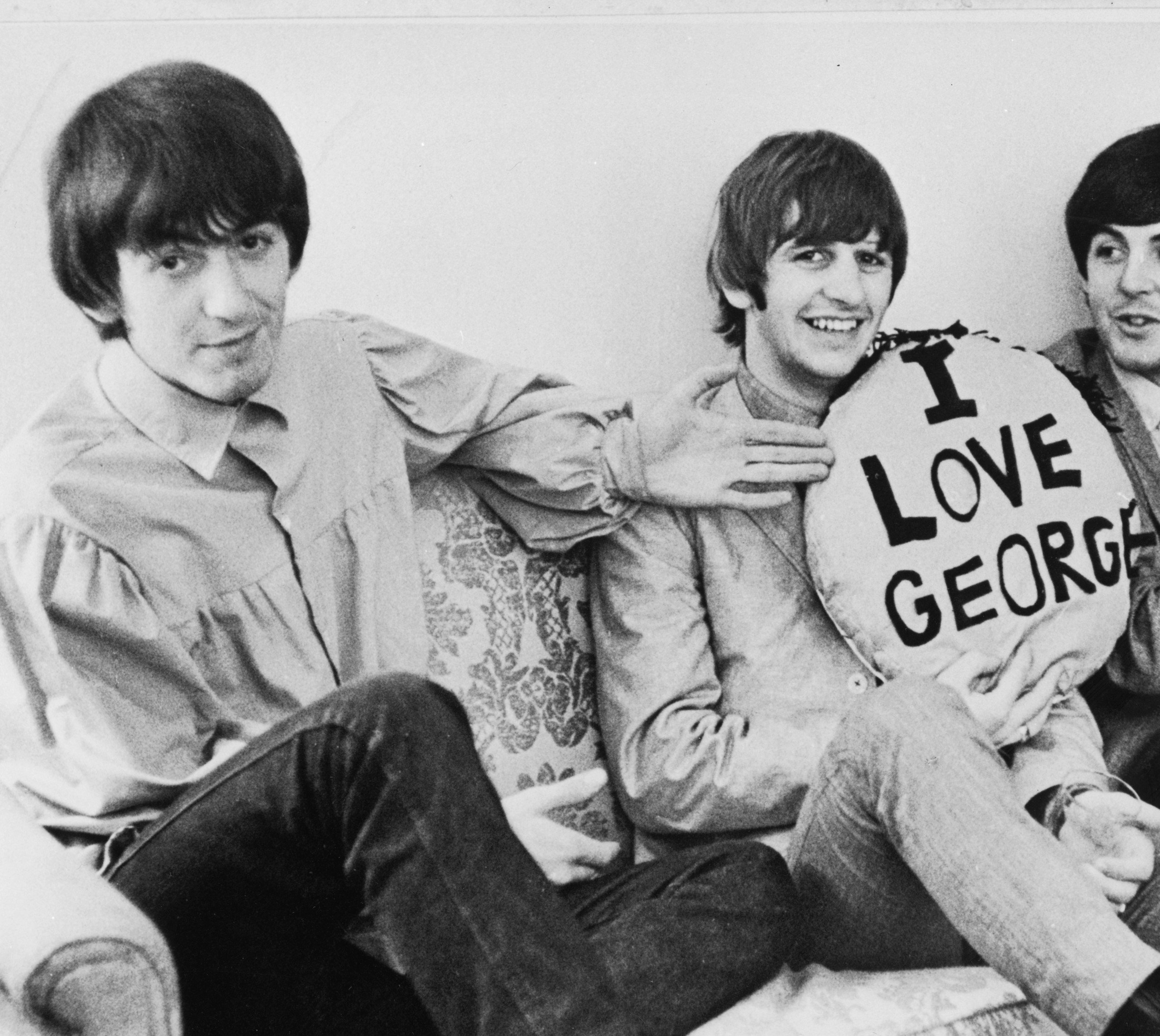 The Beatles' George Harrison and Ringo Starr with a pillow
