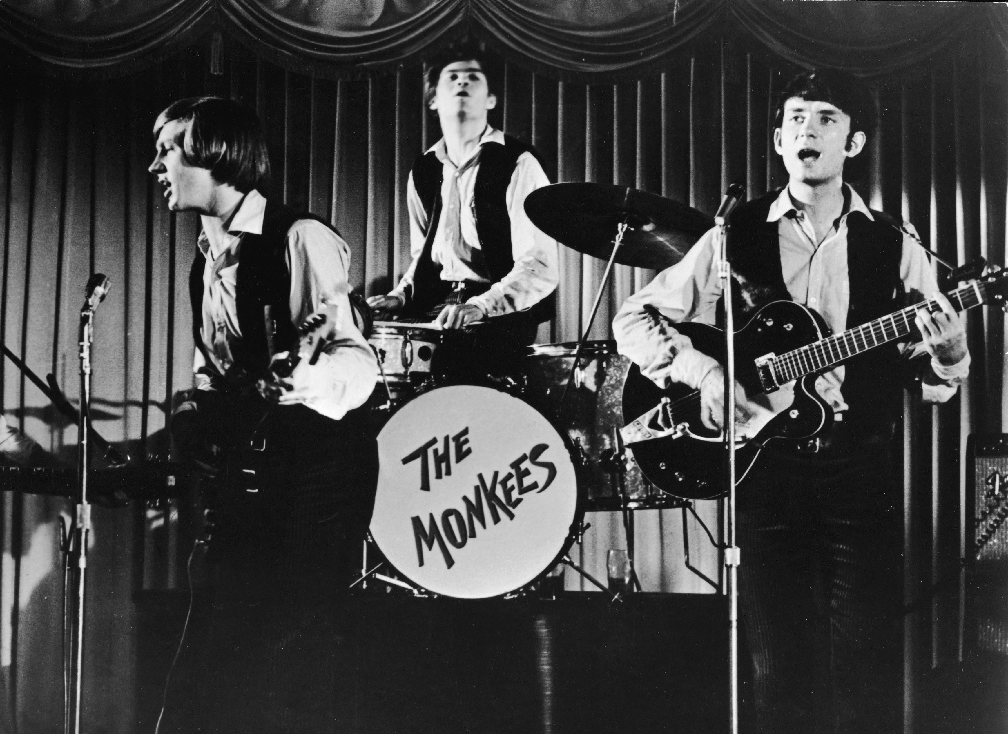 The Monkees with a drum