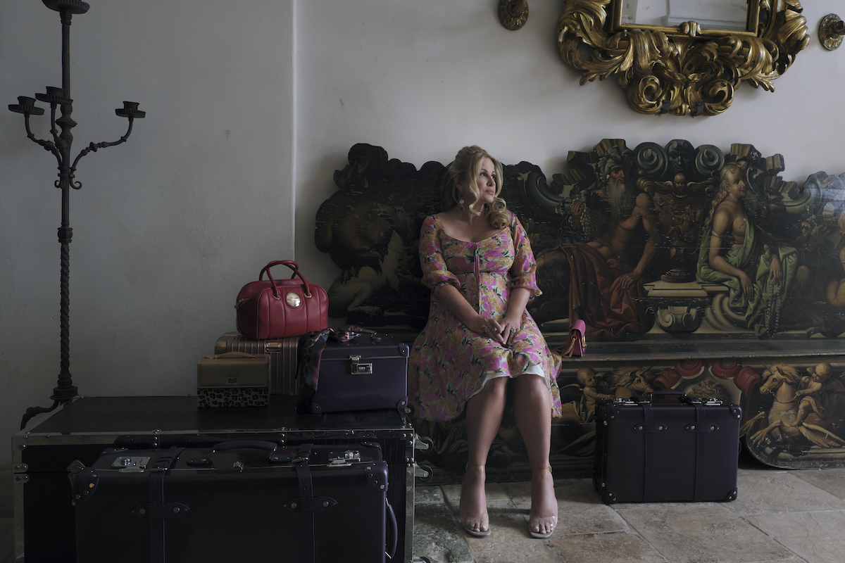 Tanya (Jennifer Coolidge) waiting to return to the hotel in 'The White Lotus Sicily' finale