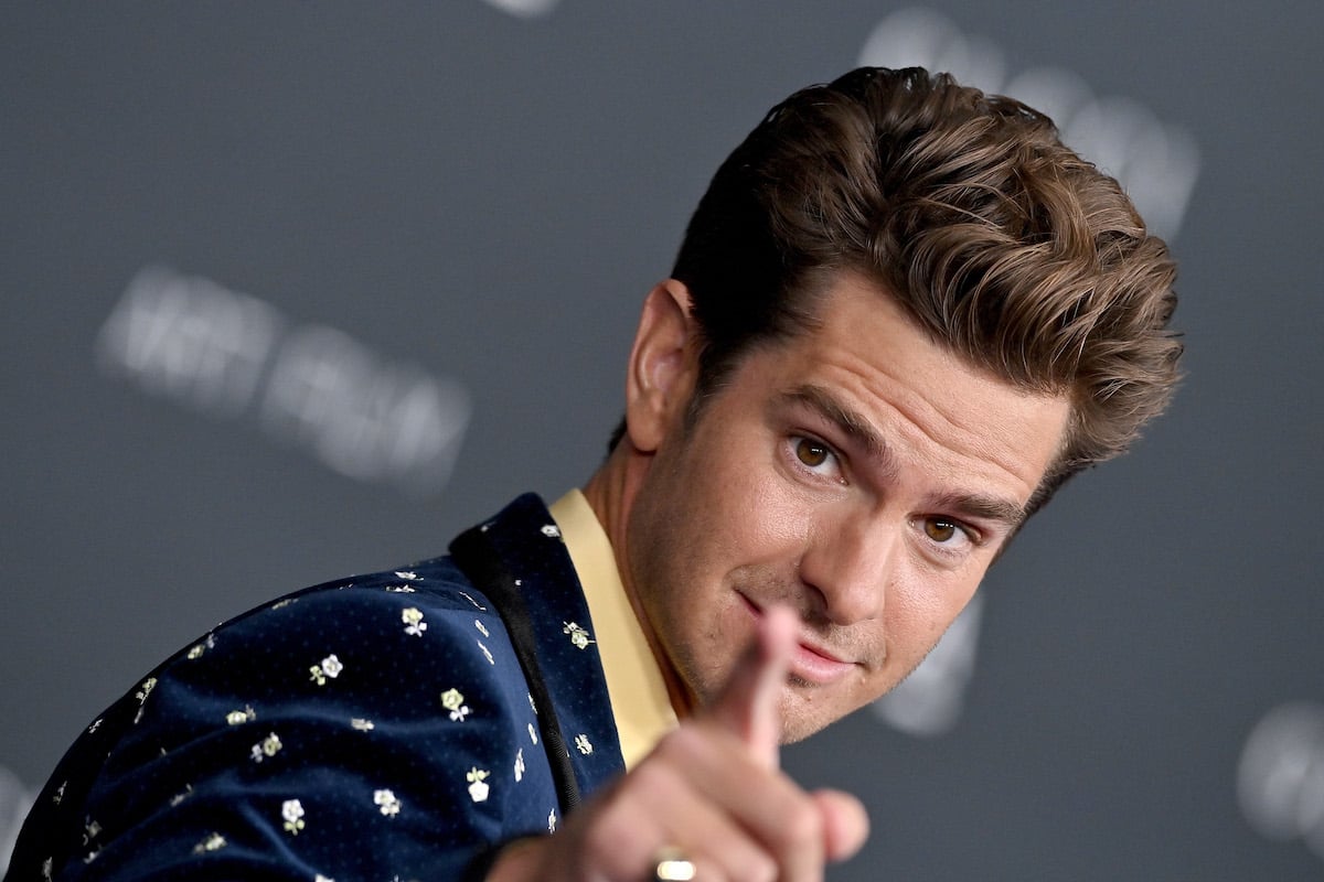 Andrew Garfield points at the camera during the 11th Annual LACMA Art + Film Gala red carpet