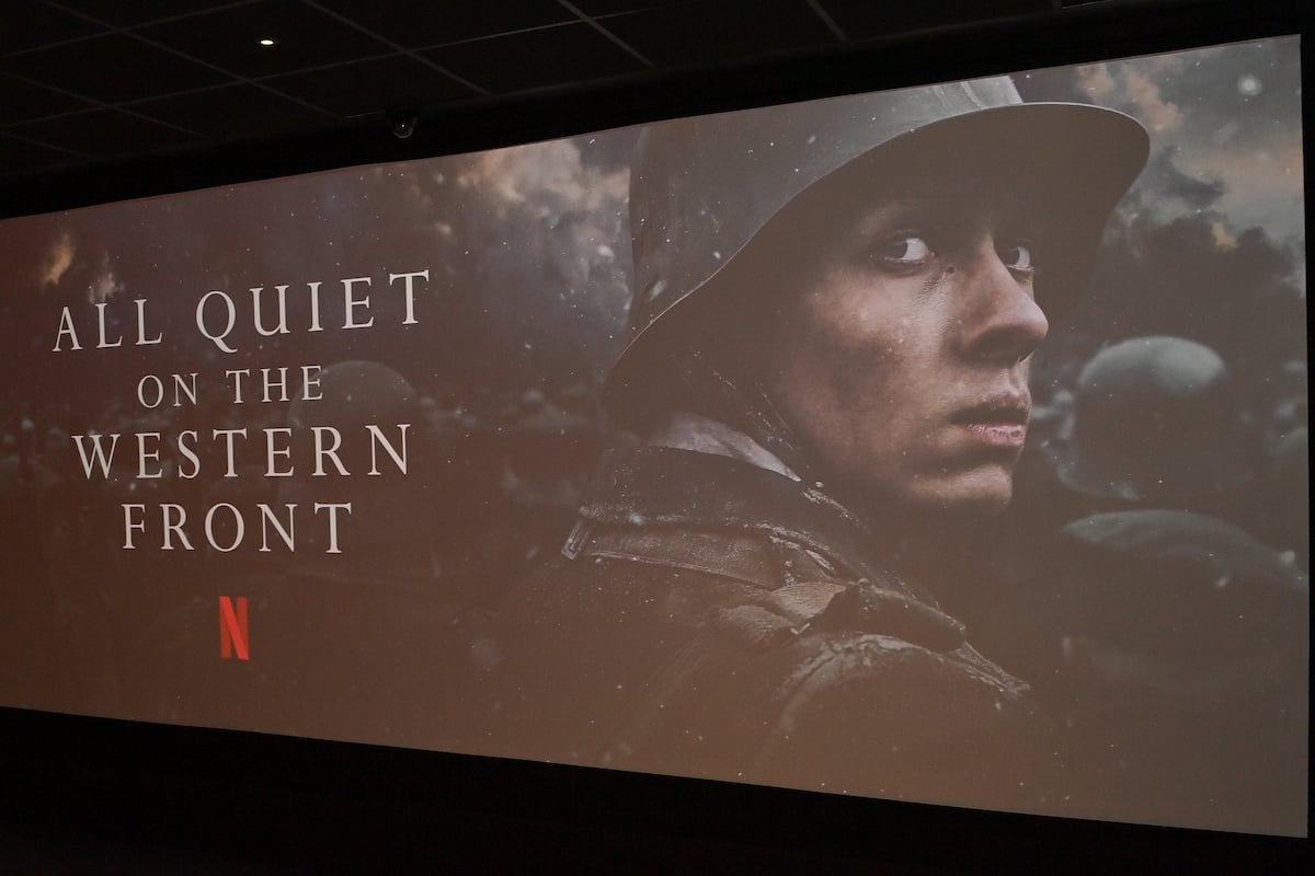 "All Quiet on the Western Front" logo and key image on display at a screening