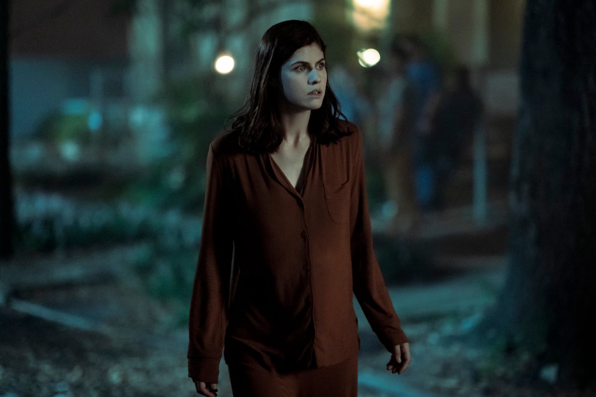 'Anne Rice's The Mayfair Witches': Alexandra Daddario stands looking serious outside