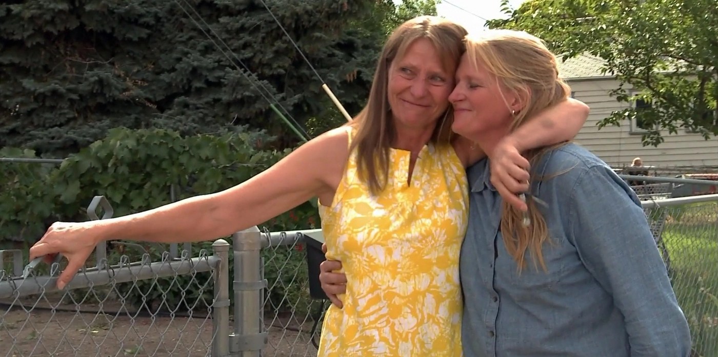 Annie Stevens and Christine Brown embrace. Both former followers of polygamy have sought divorces