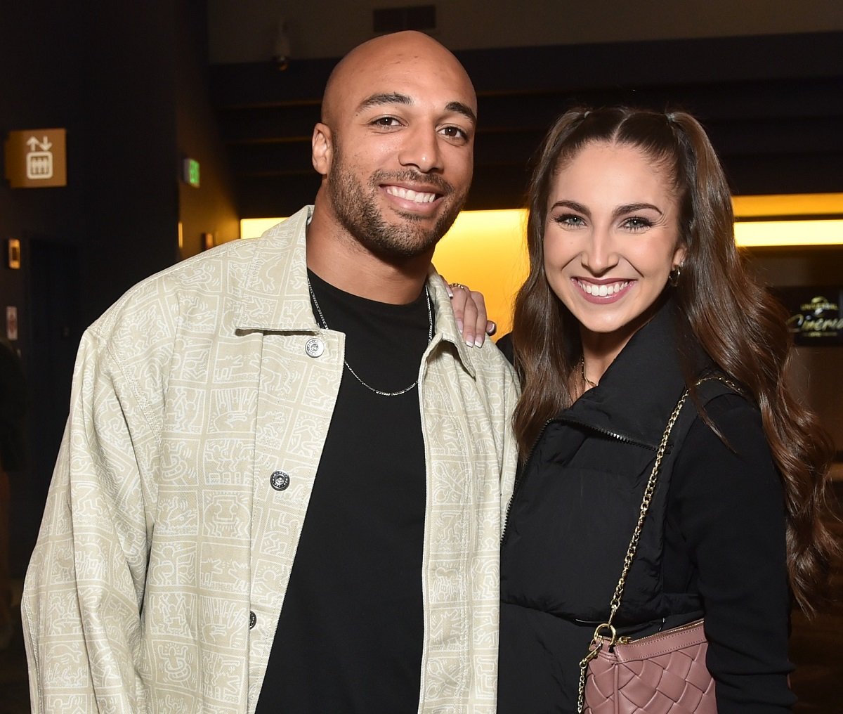 Austin Ekeler and girlfriend Melanie Wilking attend Universal Pictures Presents a special screening of M3GAN