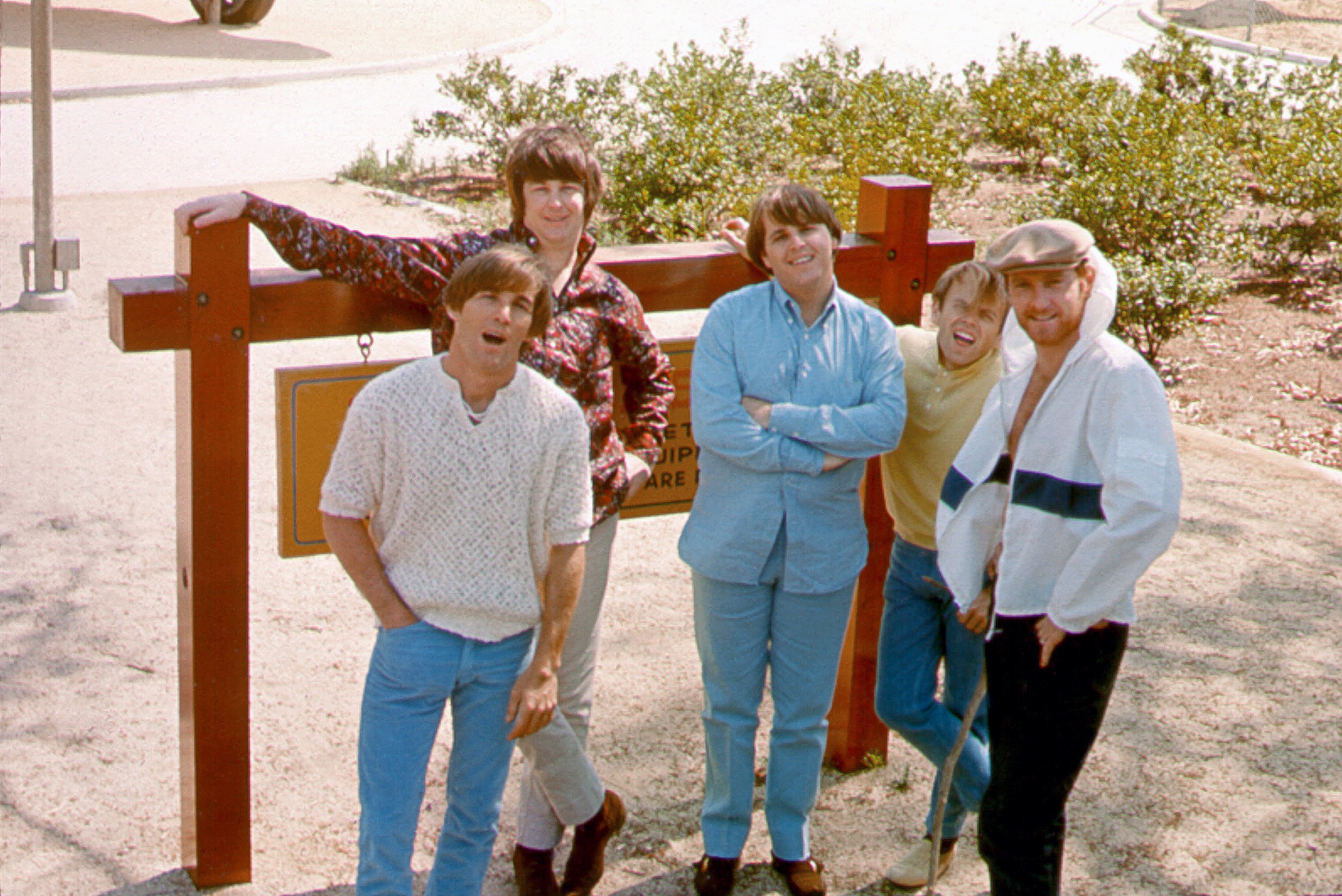 Rock and roll group the Beach Boys pose in 1965 (Dennis Wilson, Brian Wilson, Carl Wilson, Al Jardine, Mike Love)
