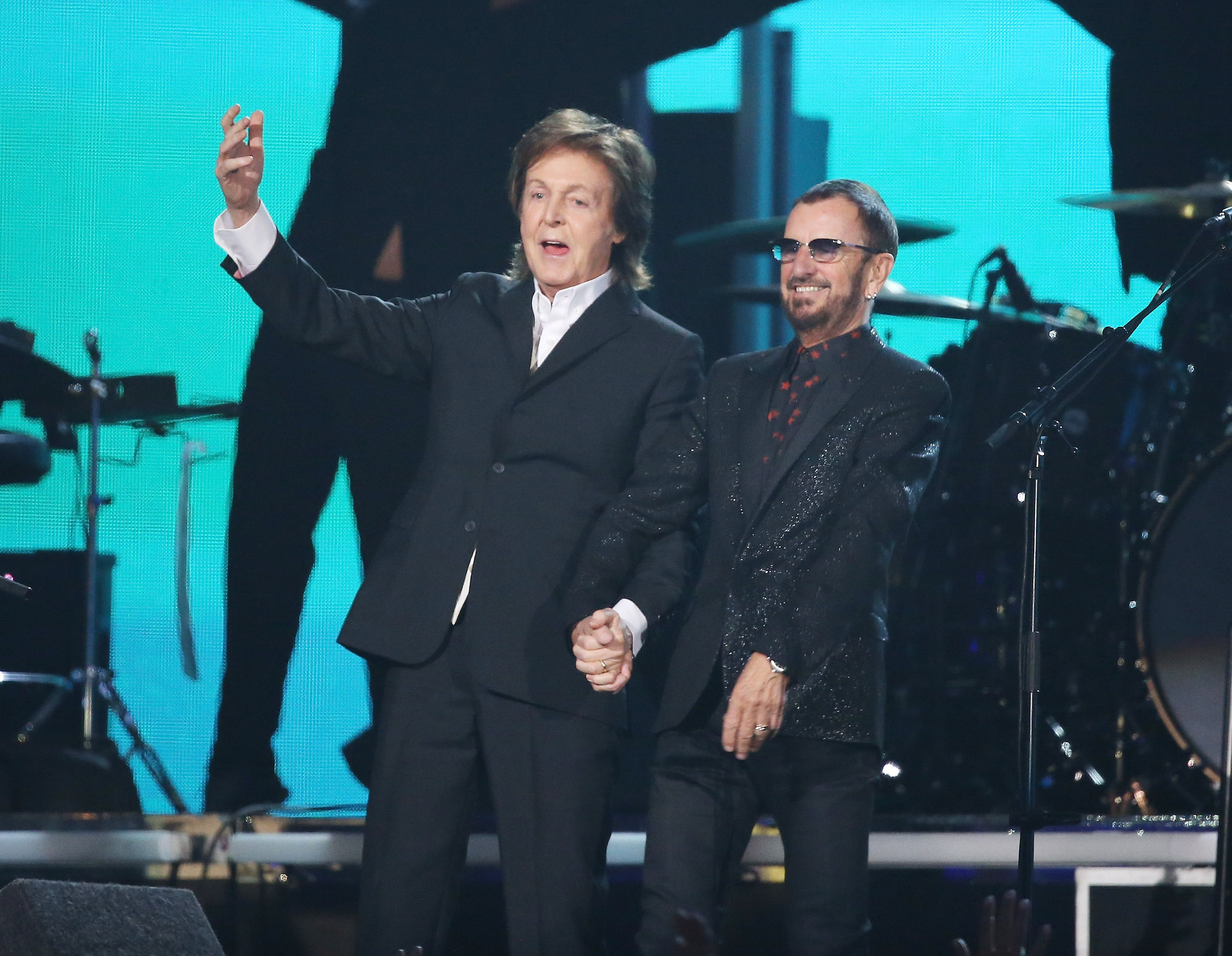 Paul McCartney and Ringo Starr formerly of The Beatles perform during the 56th Grammy Awards in Los Angeles