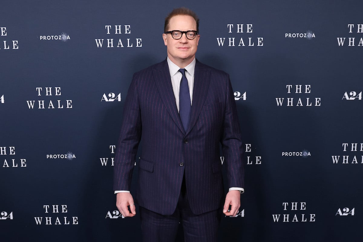 Brendan Fraser attends a screening of "The Whale" in a navy suit