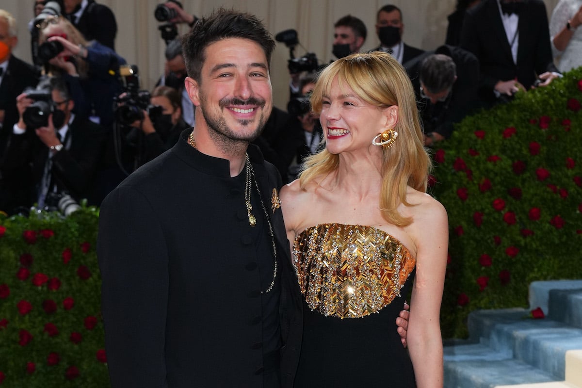 Marcus Mumford and Carey Mulligan smile for the cameras at The 2022 Met Gala