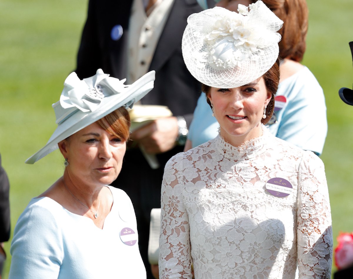 Carole Middleton and Kate Middleton, who said she had an 'awkward situation' with her mom after she became engaged to Prince William in 2010, stands next to her mom at the Royal Ascot