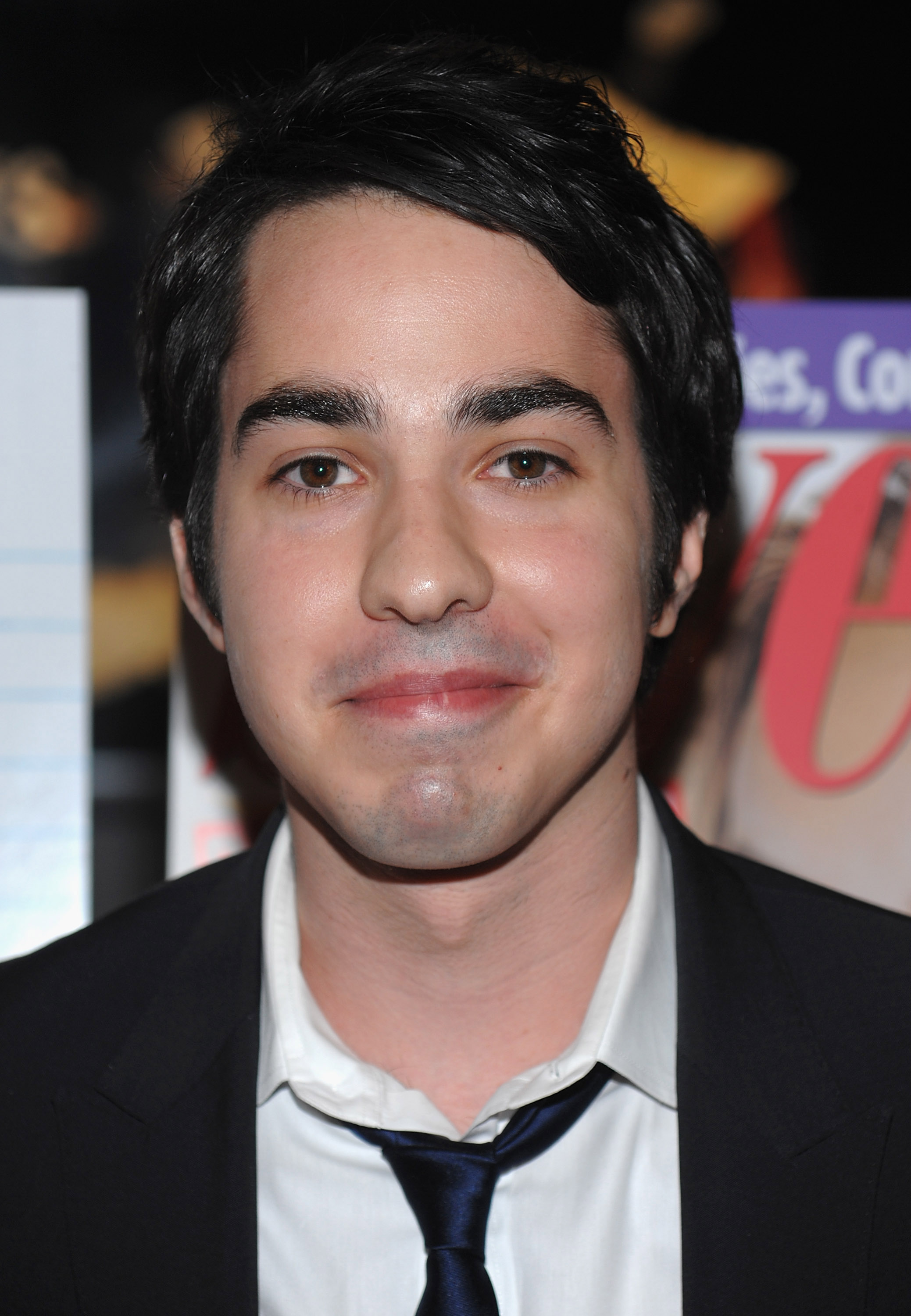 Jack Carpenter wearing a black suit and tie poses for a photo at the screening of 'I Love YOU Beth Cooper' Carpenter played Rory Gilmore's love interest in 'Gilmore Girls: A Year in the Life'