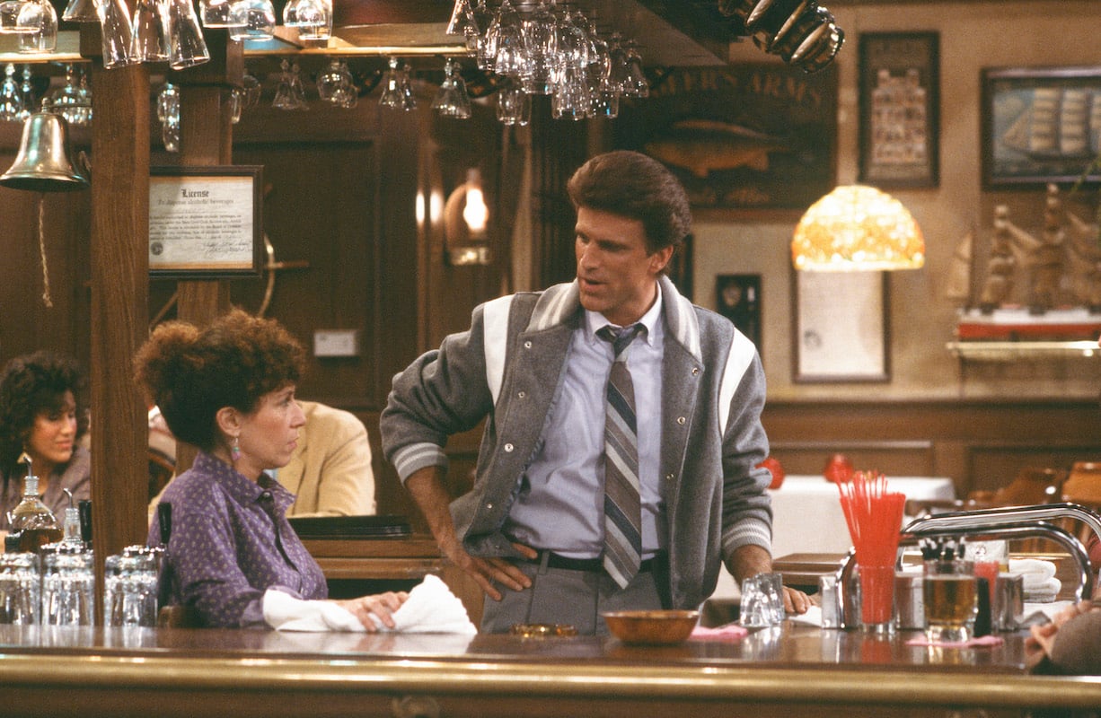 'Chers': Ted Danson puts his hand on his hip while Rhea Perlman wipes the bar with a cloth