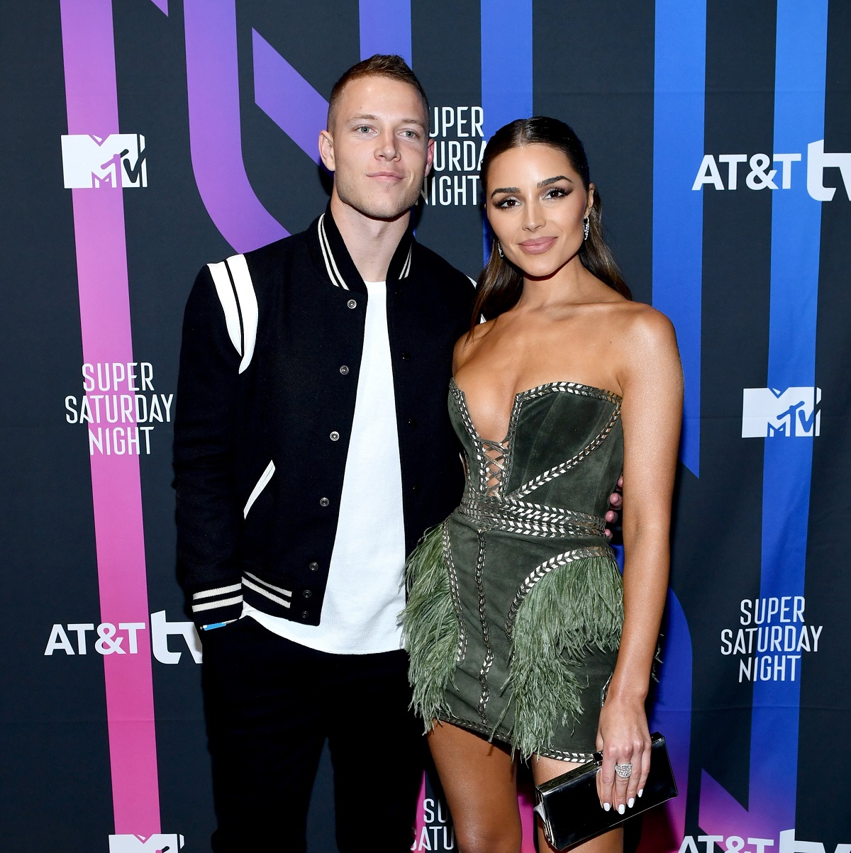 Christian McCaffrey and Olivia Culpo attend AT&T TV Super Saturday Night event in Miami