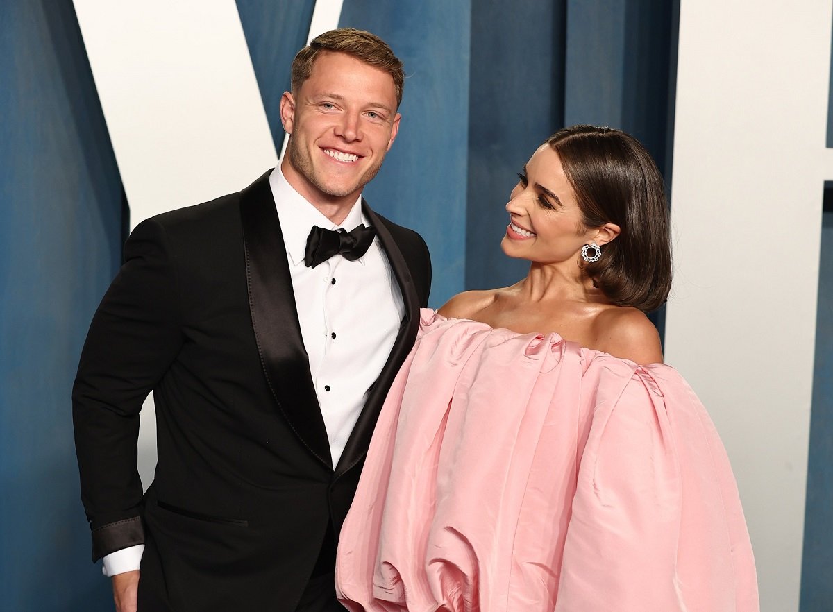 Christian McCaffrey and Olivia Culpo attend the 2022 Vanity Fair Oscar Party