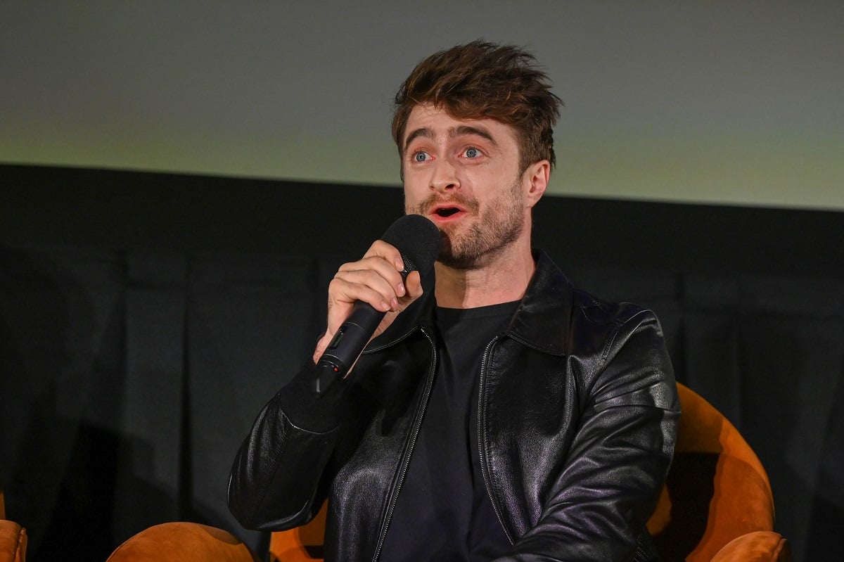 Daniel Radcliffe speaking at the premiere of 'Weird: The Al Yankovic Story'.