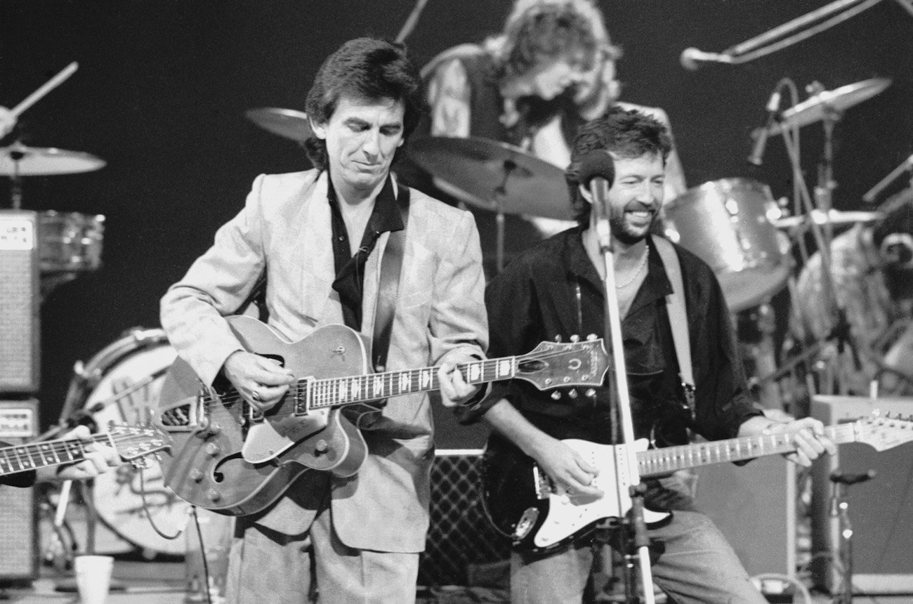 George Harrison and Eric Clapton performing on a TV program in 1985.