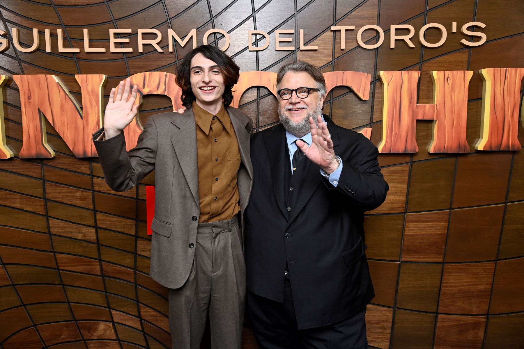 Finn Wolfhard and Guillermo Del Toro at a premiere of 'Guillermo Del Toro's Pinocchio' at the Museum of Modern Art