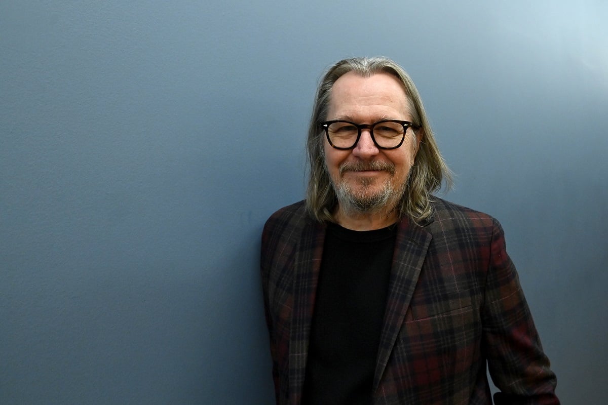 Gary Oldman posing for a photo.