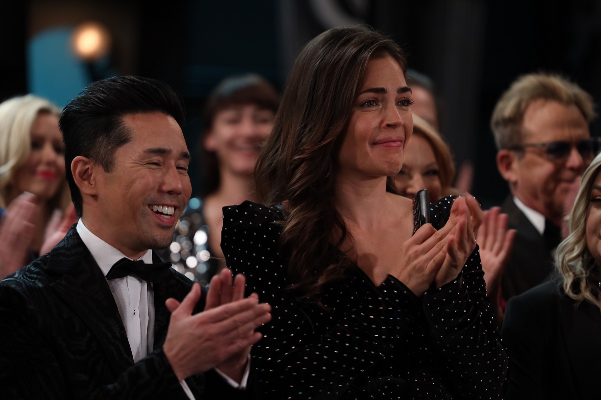 'General Hospital' star Parry Shen in a tuxedo and Kelly Thiebaud in a black dress; film a party scene from the soap opera.