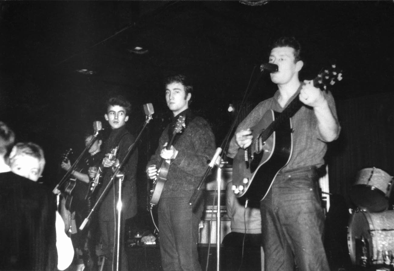 George Harrison and The Beatles performing in Hamburg, Germany.