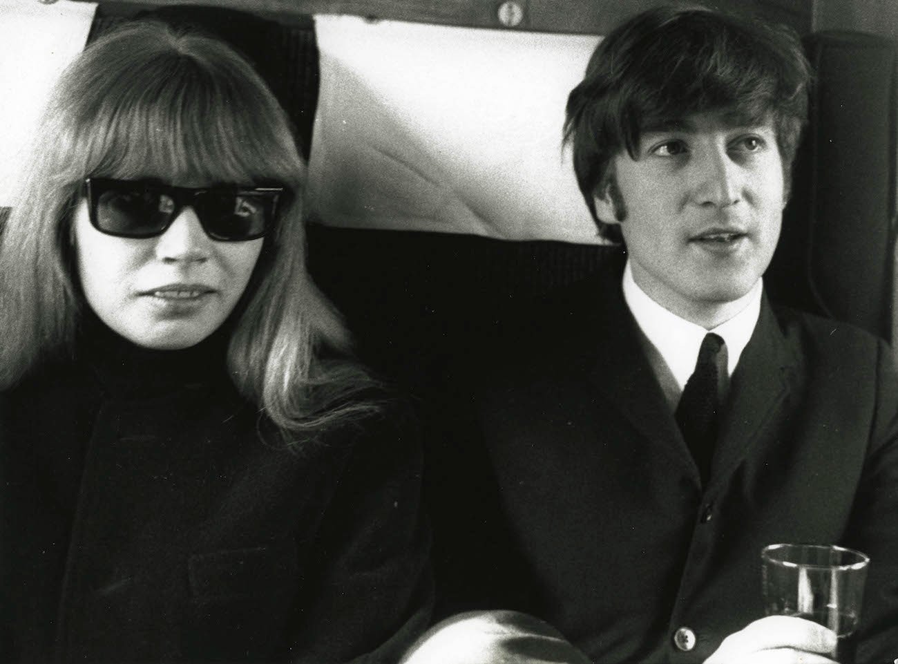 Astrid Kirchherr and John Lennon on the set of The Beatles' 'A Hard Day's Night' in 1964.