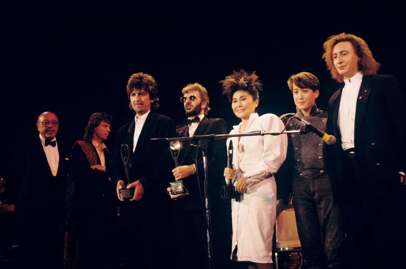 George Harrison, Ringo Starr, Yoko Ono, Sean Lennon, and Julian Lennon at The Beatles' Rock & Roll Hall of Fame induction ceremony in 1988.