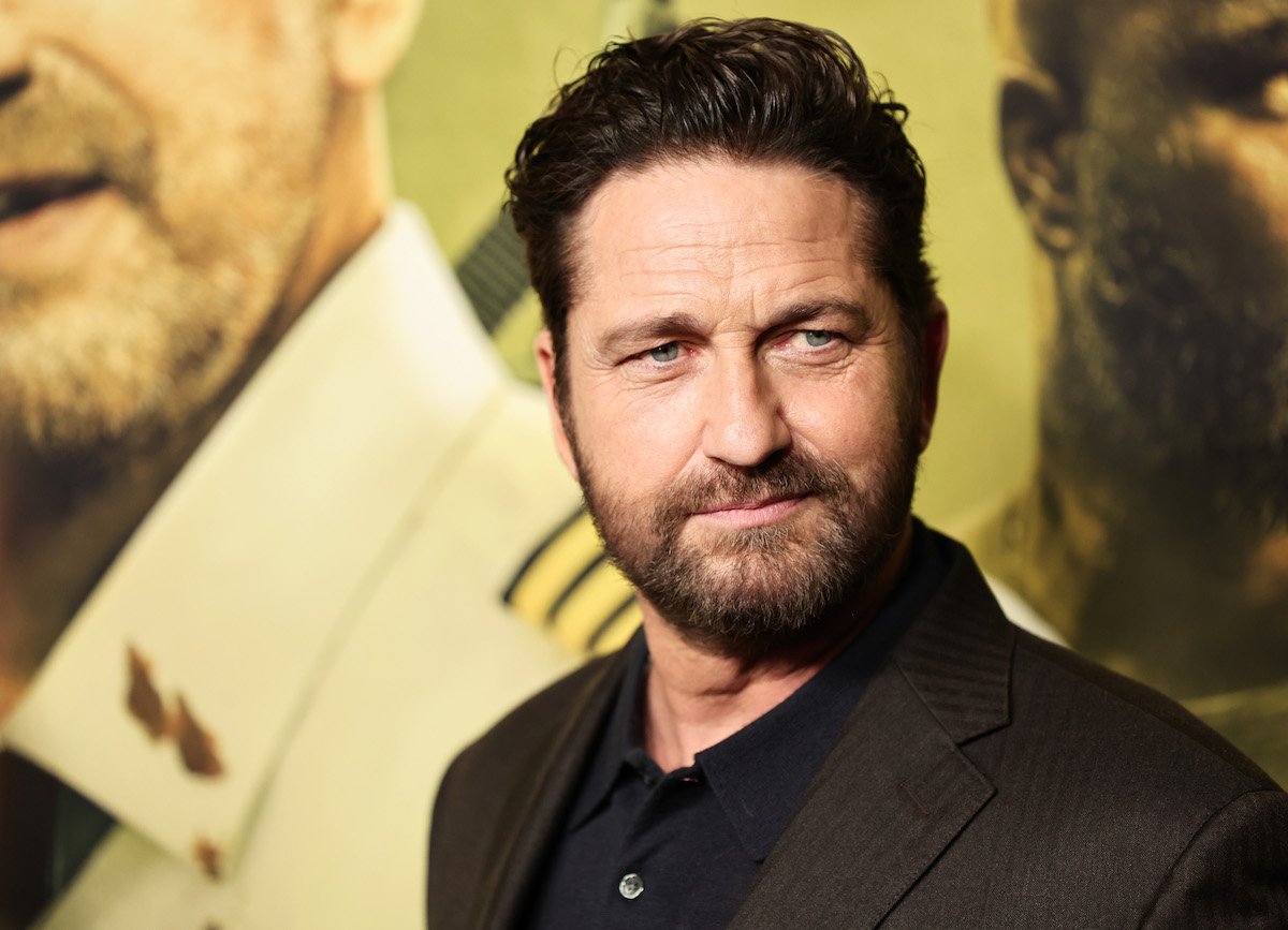 Gerard Butler poses for photos at a screening for "Plane"
