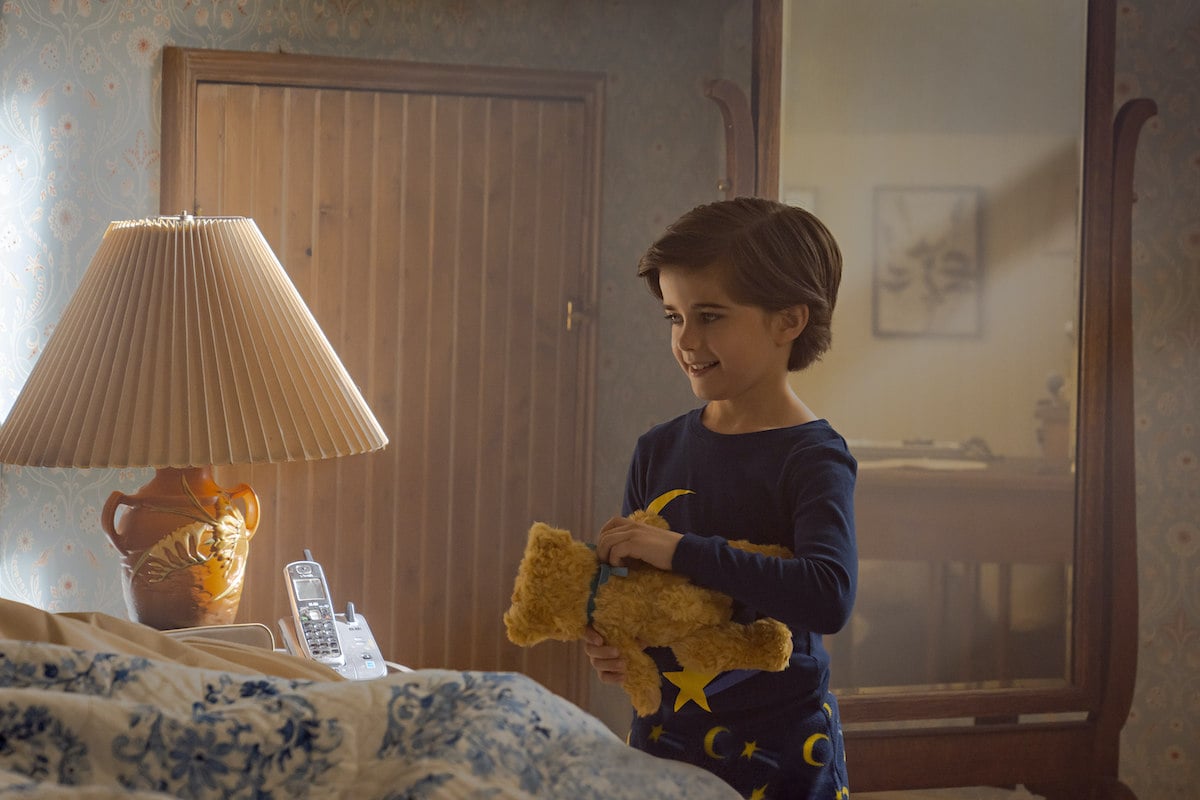 Jacob holding a teddy bear on the Hallmark Channel series 'The Way Home' 