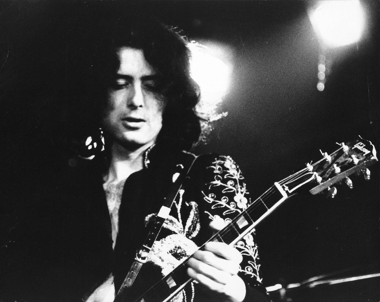 Led Zeppelin founder Jimmy Page plays his Gibson guitar during a 1972 concert.