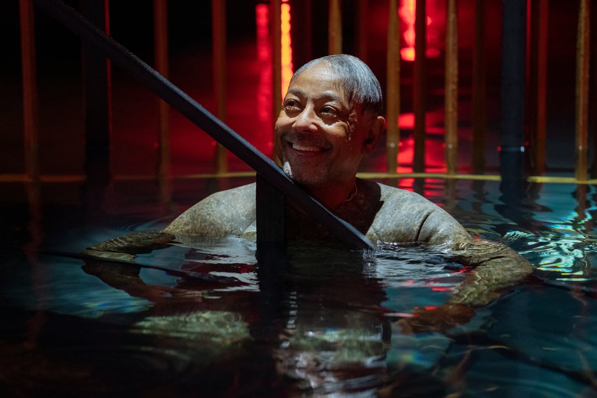 Giancarlo Esposito as Leo Pap in Kaleidoscope. Esposito swims in the vault while filming the White episode.  