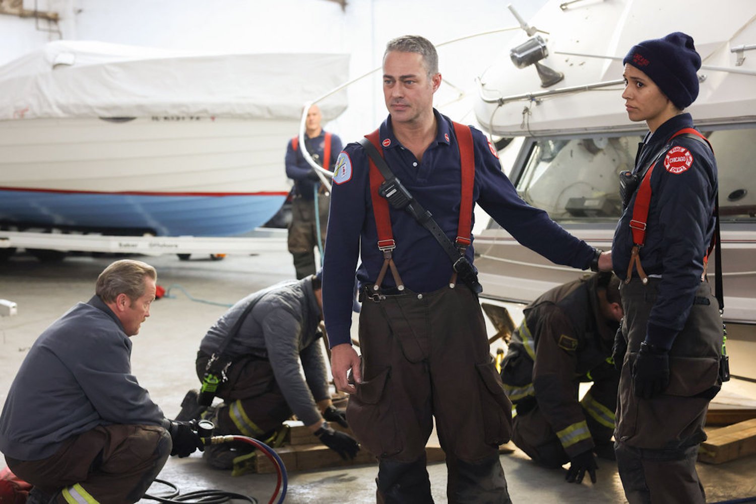 Kelly Severide standing next to Stella Kidd in uniform in 'Chicago Fire' Season 11