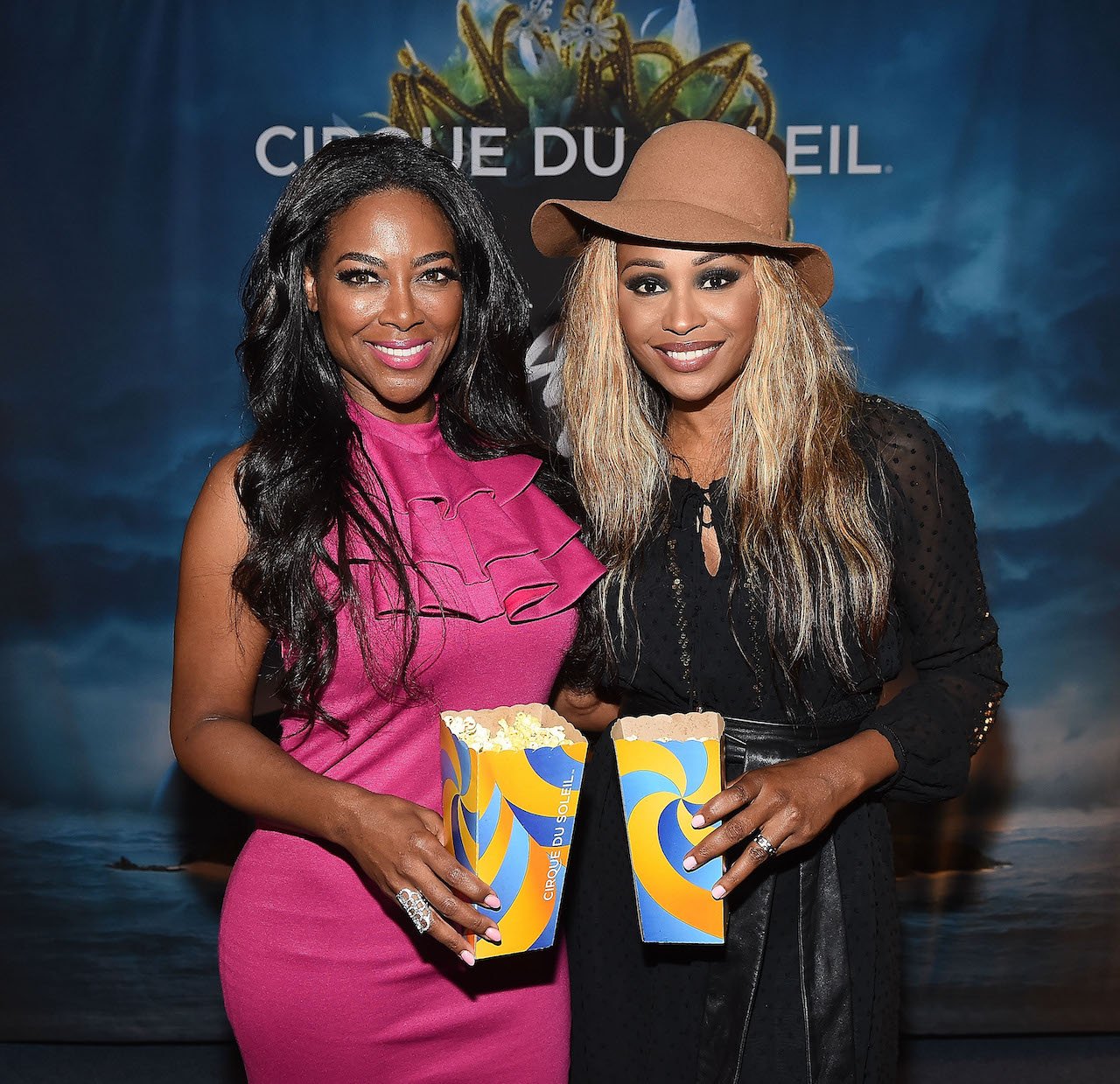 Kenya Moore and Cynthia Bailey pose while at the movies