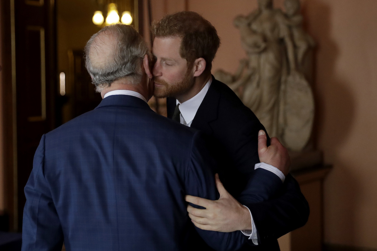 Prince Harry and King Charles III arrive to attend the 'International Year of The Reef' 2018 meeting at Fishmongers Hall on February 14, 2018, in London, England.