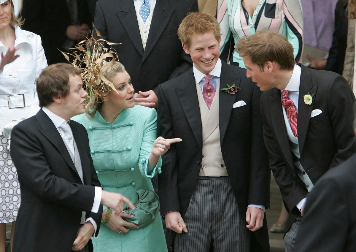 (L-R) Tom Parker Bowles, Laura Parker Bowles, Prince Harry and Prince William depart the civil ceremony following the marriage between their parents then-Prince Charles and Camilla Parker Bowles
