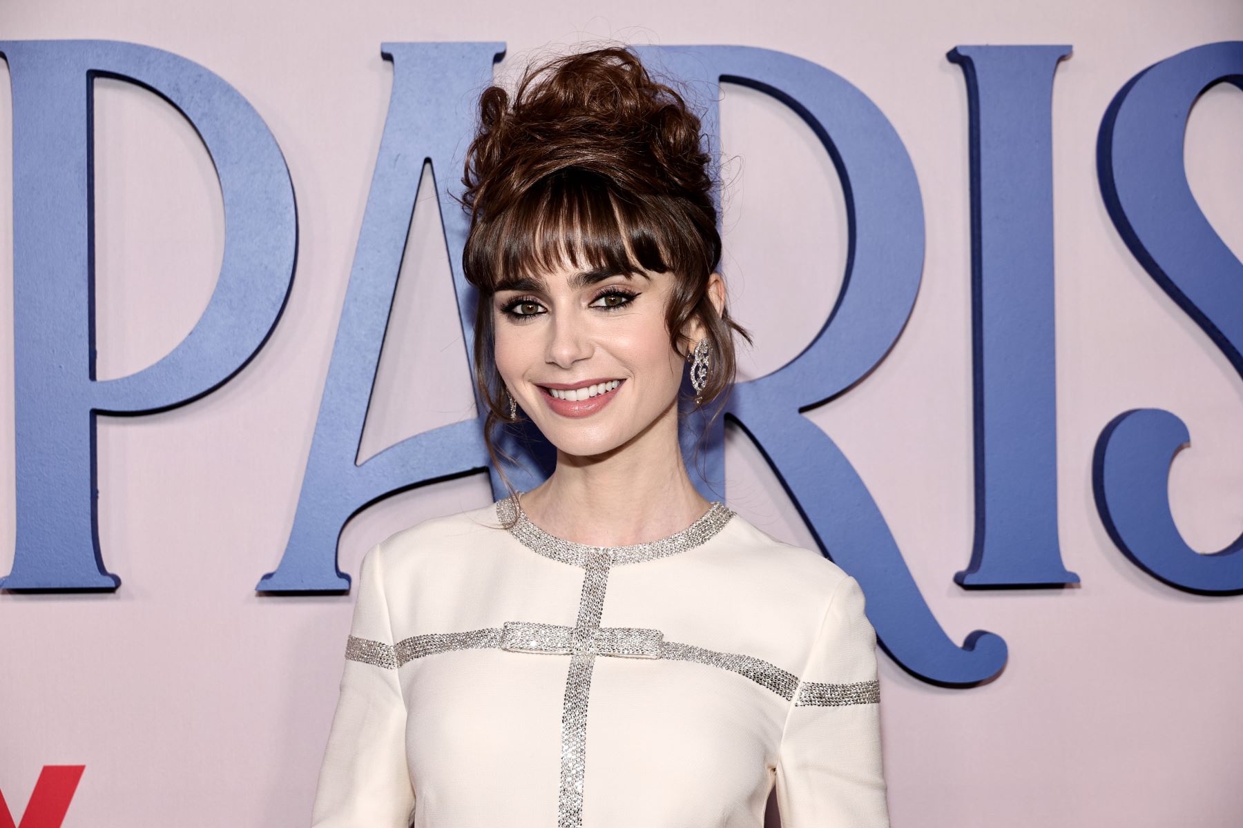 Lily Collins at the 'Emily in Paris' French Consulate Red Carpet in New York City