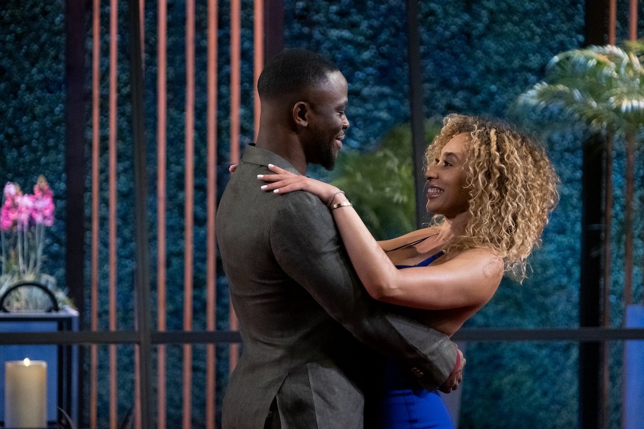 SK Alagbada and Raven Ross embrace in season 3 of 'Love Is Blind'.
