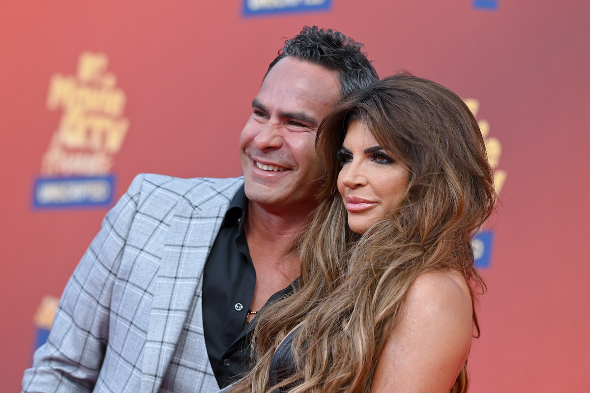 Luis Ruelas and Teresa Giudice smile on the red carpet at the 2022 MTV Movie & TV Awards