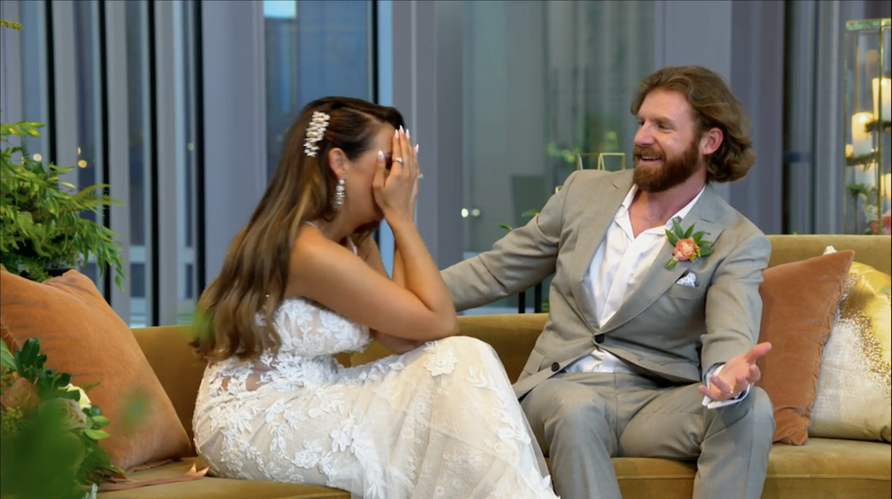 Gina and Clint share a laugh after their wedding on Lifetime's 'Married at First Sight' season 16