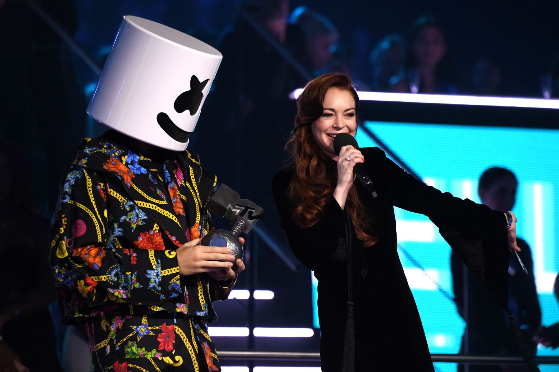 Lindsay Lohan presenting Marshmellow with the 'Best Electronic Artist' award at the 2018 MTV EMAs