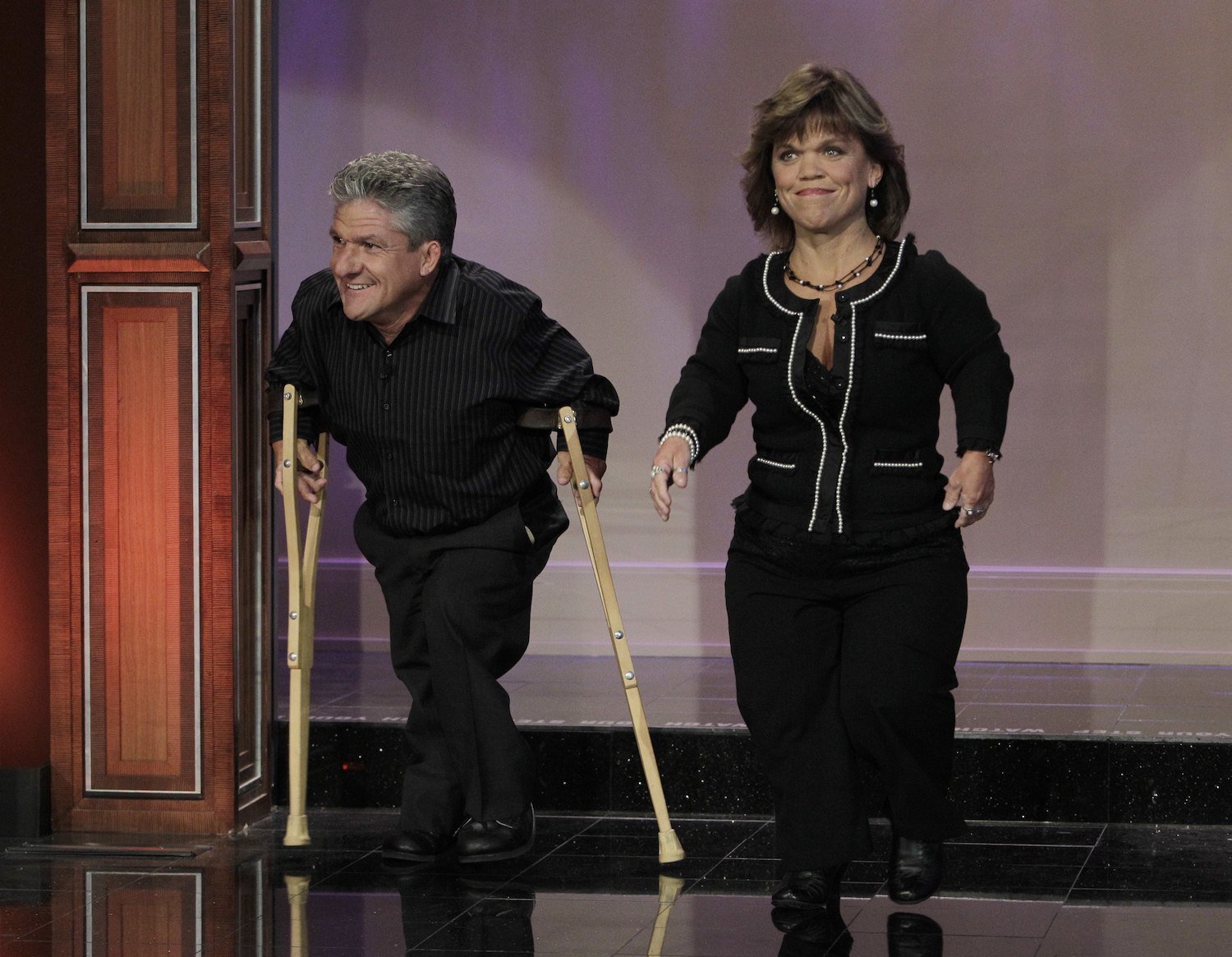 Matt and Amy Roloff from 'Little People, Big World' walking on a stage together