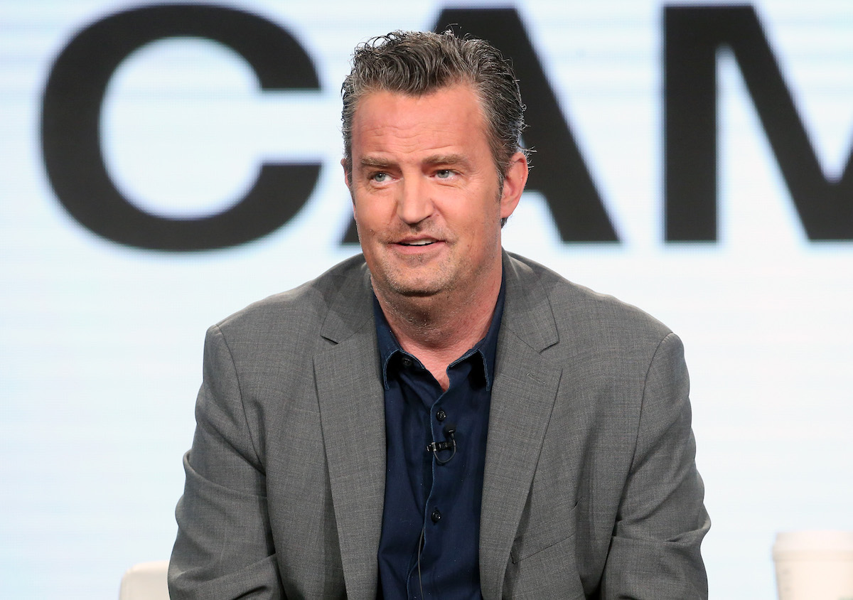 Matthew Perry appears on stage during an event. 