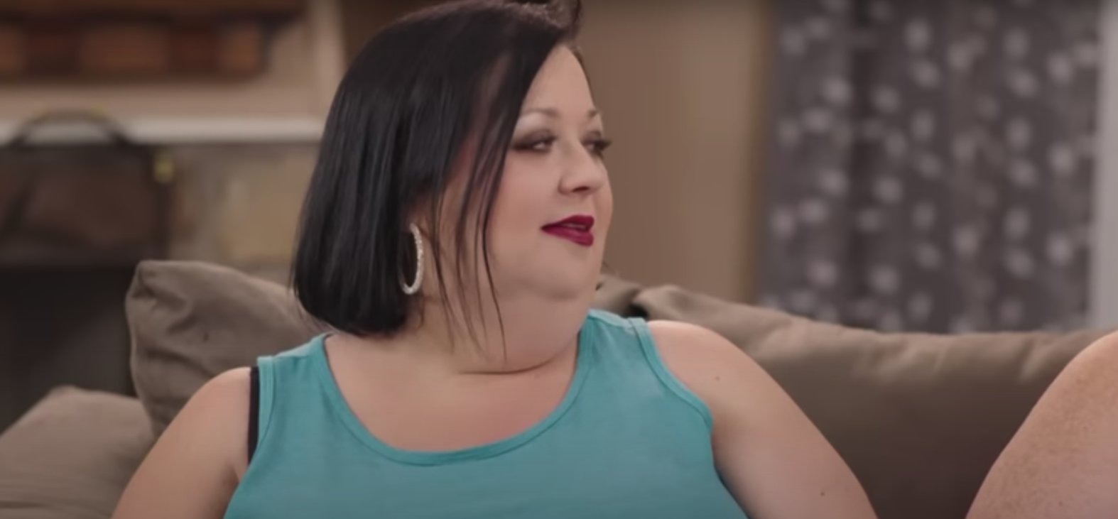 Meghan Crumpler of '1000-lb Sisters' wearing a light blue tank top