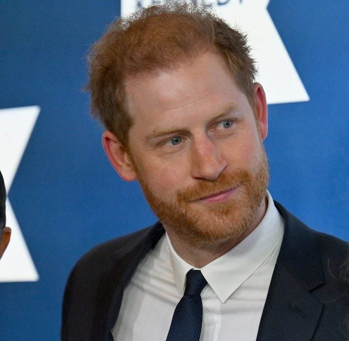 Meghan Markle and Prince Harry, who a royal photographer says had a breakdown in their relationship after he met the duchess, arrive at the 2022 Robert F. Kennedy Human Rights Ripple of Hope Award Gala