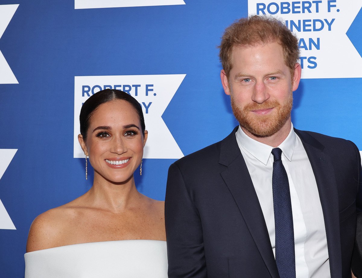 Meghan Markle and Prince Harry, who some commentators expect to make a 'shift' after 'Spare', pose for cameras at the Ripple of Hope Gala