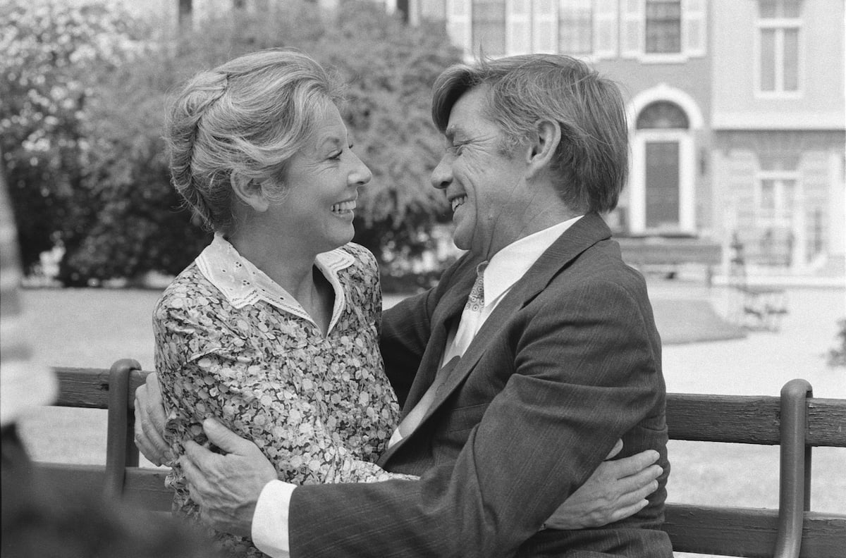 Black and white photo of Michael Learned and Ralph Waite embracing on 'The Waltons'