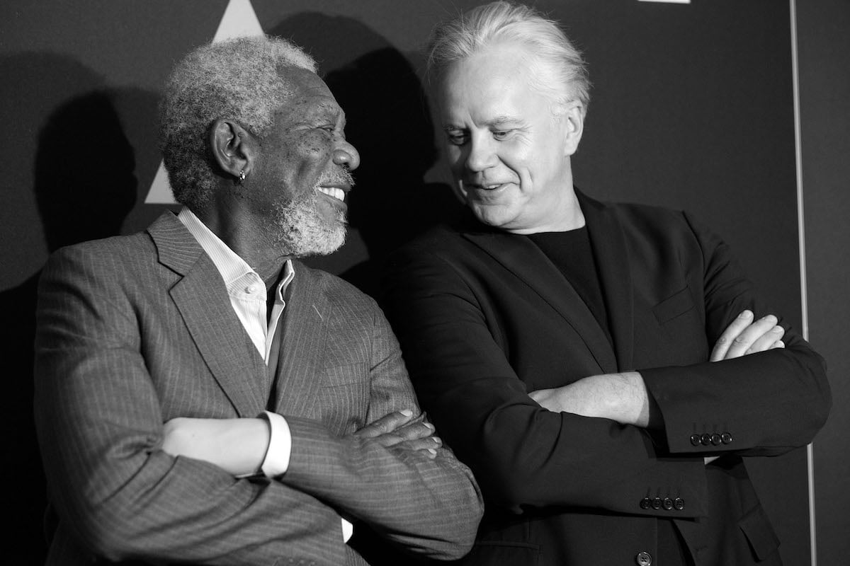 Morgan Freeman and Time Robbins smile at a screening of "The Shawshank Redemption in 2014. 