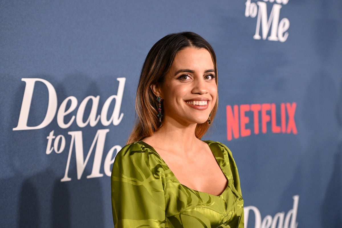Natalie Morales Poses for pictures at a "Dead to Me" Premiere event.
