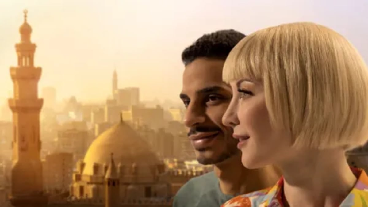 Nicole and Mahmoud staring off into the distance in front of skyline in Egypt for promo for '90 Day Fiancé: The Other Way' Season 4 on TLC.