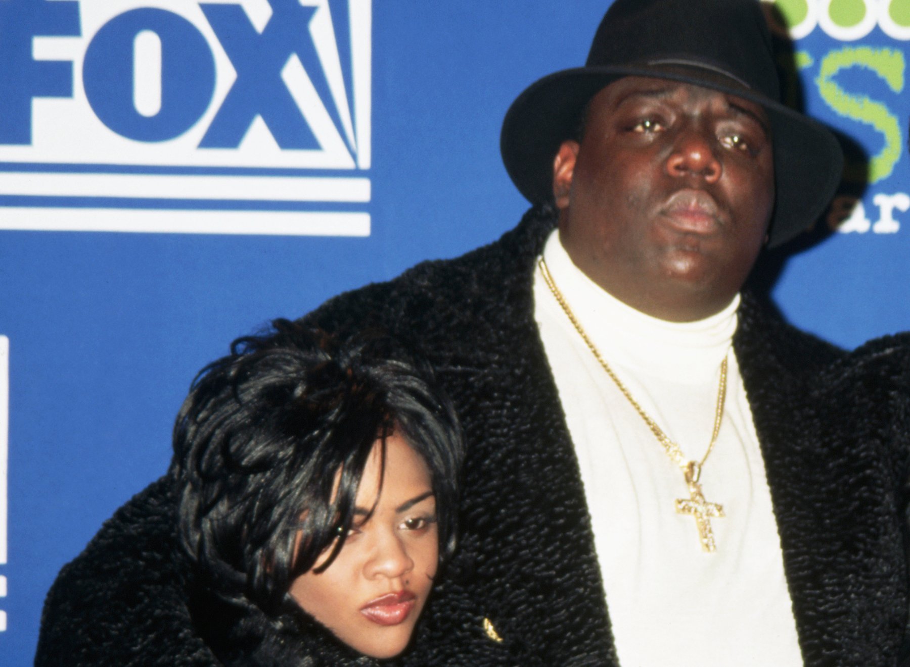 Lil' Kim and The Notorious B.I.G. posing together