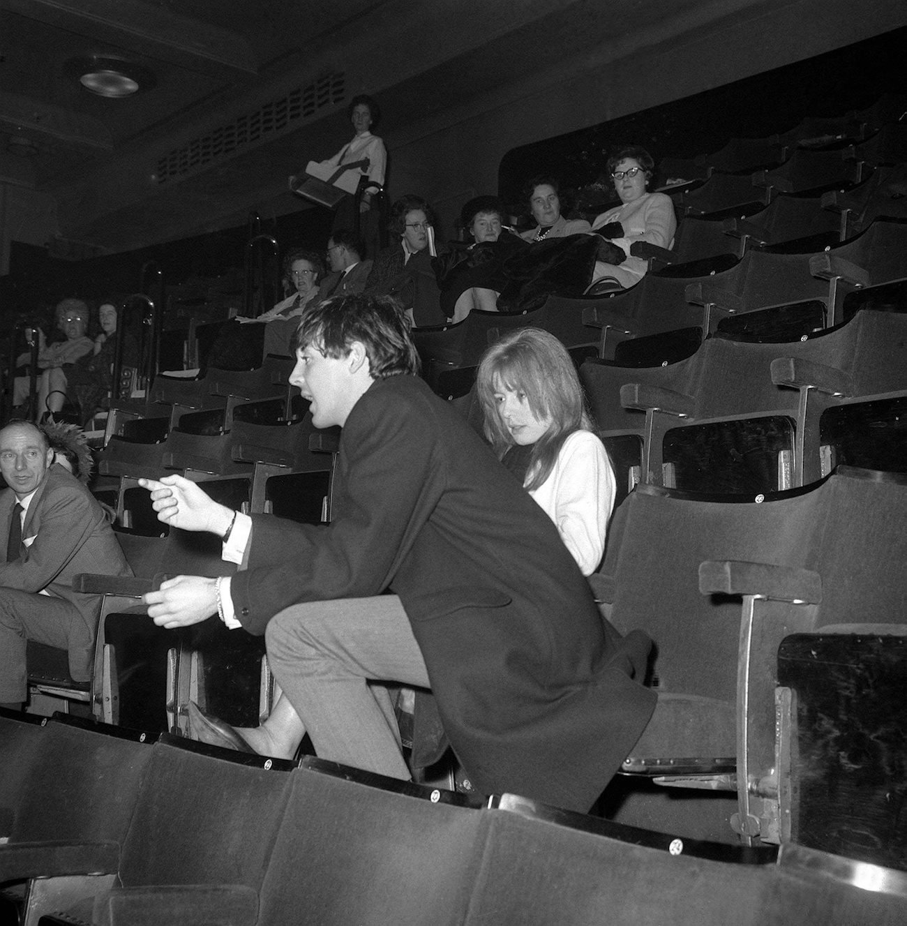 Paul McCartney and Jane Asher in a theater in 1963.