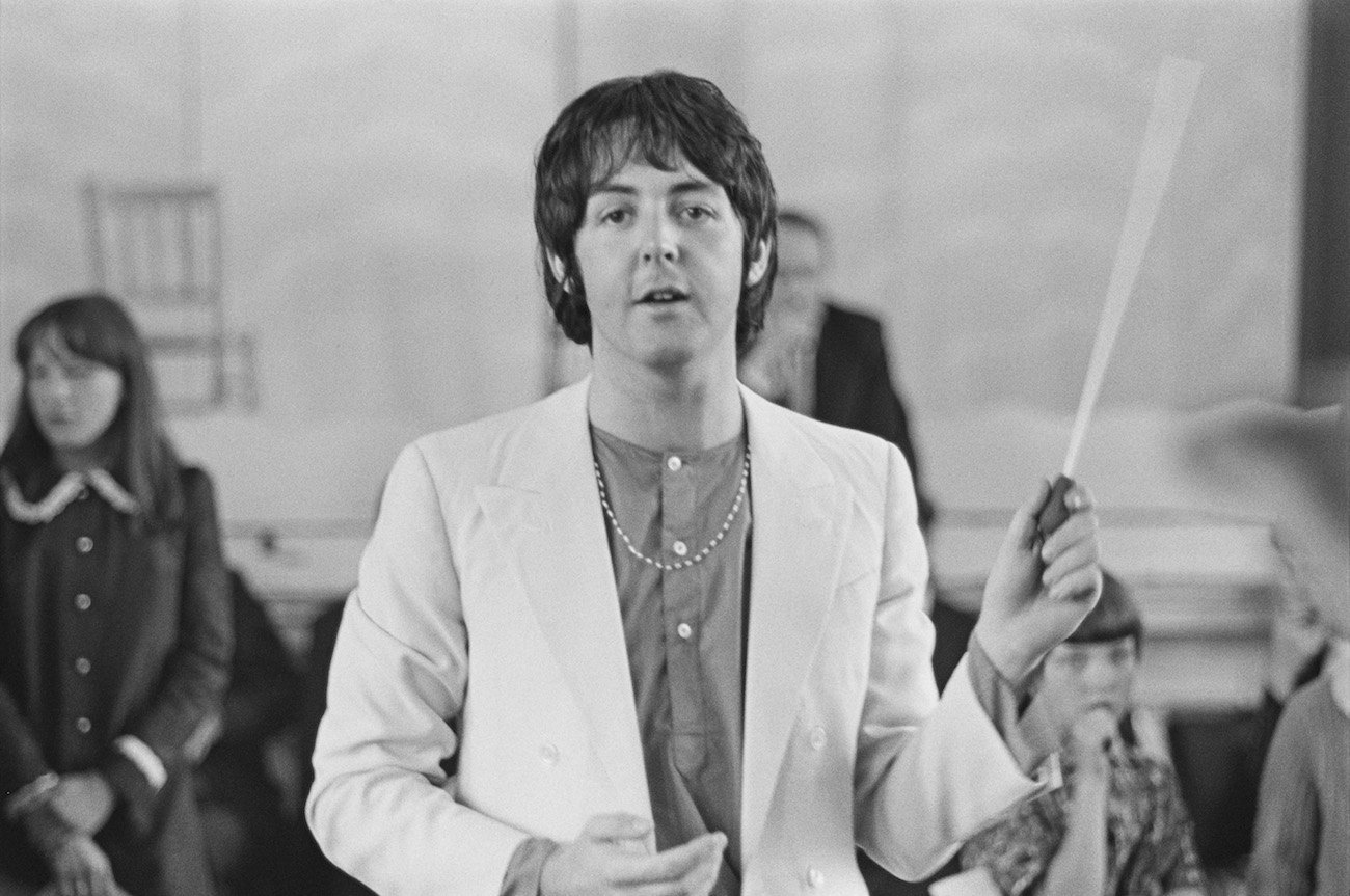 Paul McCartney in a white jacket in 1968.